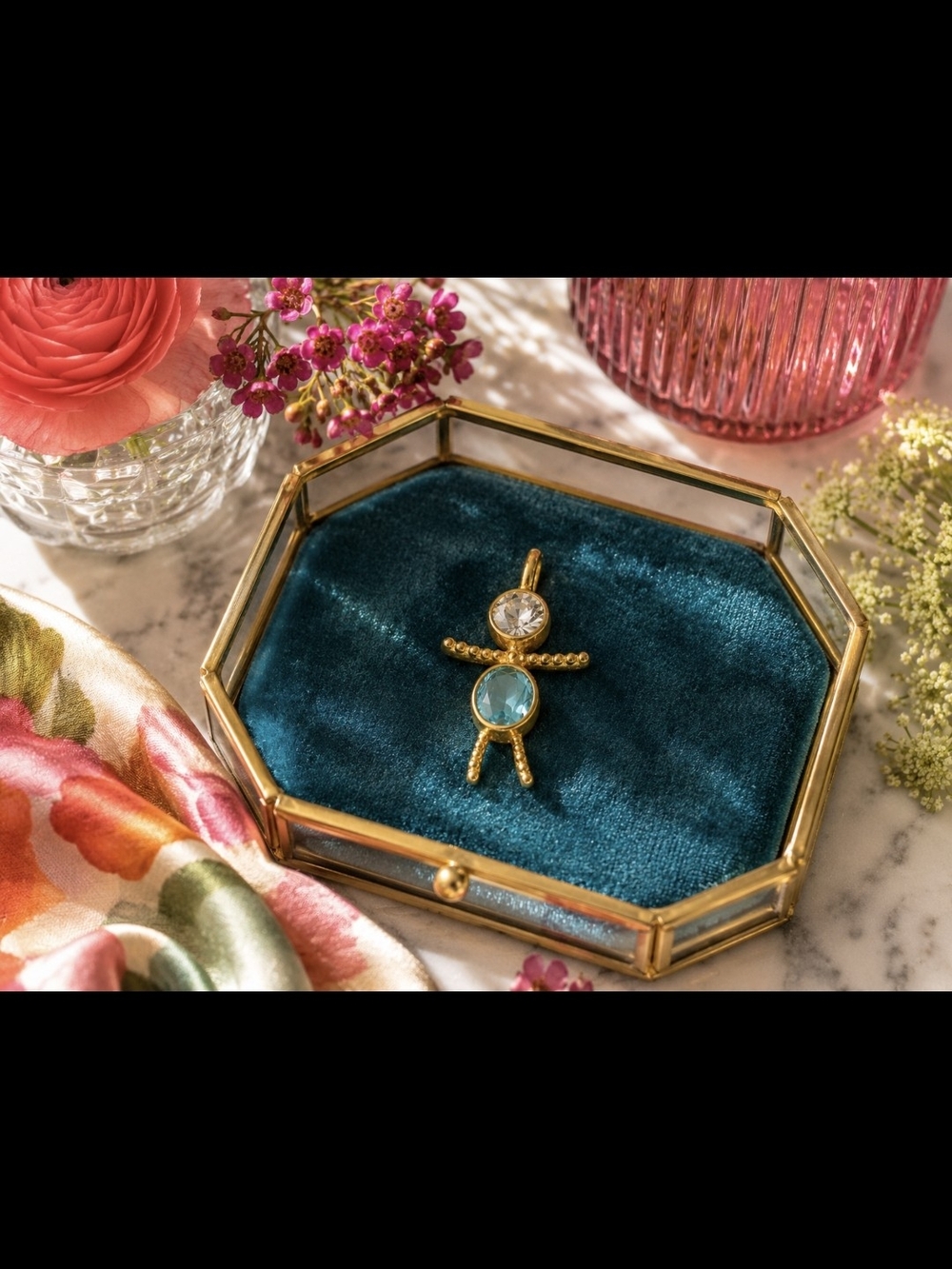 Gold-tone Gemstone Doll Charm on Teal Velvet Tray